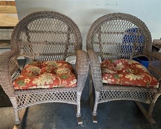 $95 - Lot 116 pair of faux wicker rocking chairs