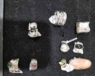 Various artisan sterling rings.
