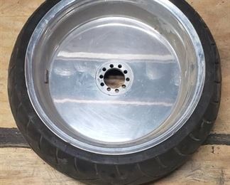 Used Metzeler ME 880 Marathon Steel Radial 240-40 R 18 m-c (79V) Rear Motorcycle Tire mounted on a solid chrome rim