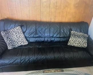 Black leather couch.