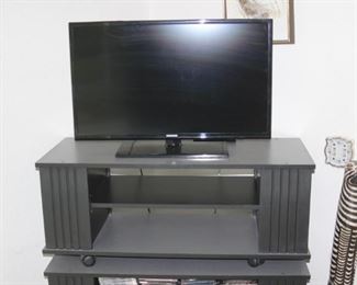 Television and TV stand.