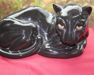 Mid century ceramic panther with eyes that light up.