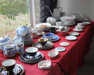 Tables of tea sets and tea cups.