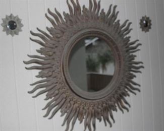 Large sun themed mirror.