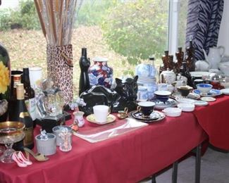 Tea cups, tea sets, vases, vintage liquor bottles, Swarovski and Orrefors.