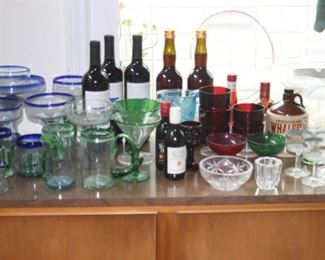Vintage liquorbottles, hand blown stemware, colored glass.