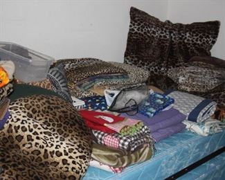 Leopard print twin sheets, blankets, bedding.