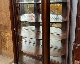 Claw foot beveled glass curio cabinet 