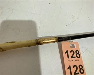 Antique horse whip with carved bone handle and gold tag