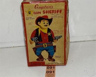 Several early toys in box