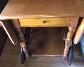 #9 Ethan Allen Tea Cart with single drawer. Each side folds down. One wheel needs repair. 