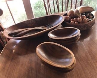 Rare oval Westin Bowl Mills hand spun wooden bowls.  Includes large salad bowl with fork and spoon, six smaller bowls.  Stamped with Weston Bowl Mills, Weston, Vermont