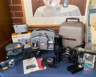 Vintage and new cameras and camera equipment
Film projector and screen 