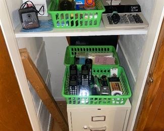 Office supplies, project screen, and other small electronics. 
2 drawer metal file cabinet 