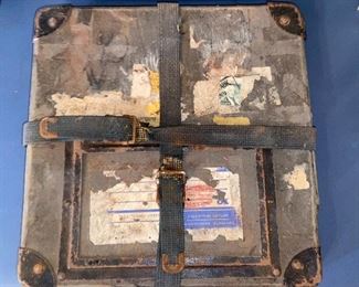 Antique film reels mailing case with film reel. 