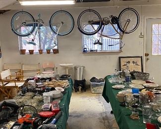 PAIR OF LIKE NEW HUFFY BIKES HANGING FROM THE CEILING