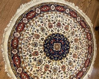 Round oriental rug.