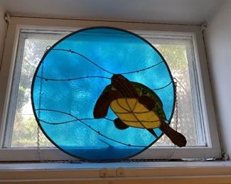 Stained glass with turtle.
