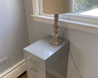 Small file cabinet and lamp.