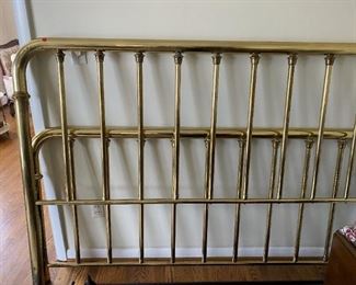 King-sized iron bed.