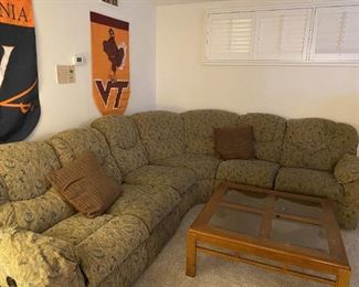 Sectional and coffee table and VT/UVA banners.