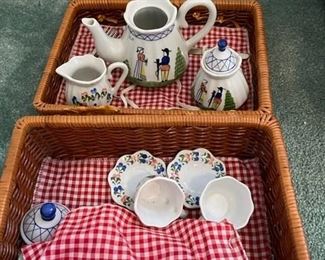 Children's tea set in picnic basket.