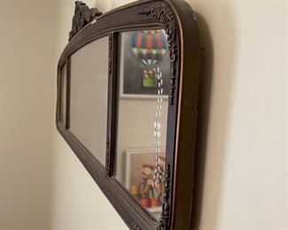 Antique wall mirror.