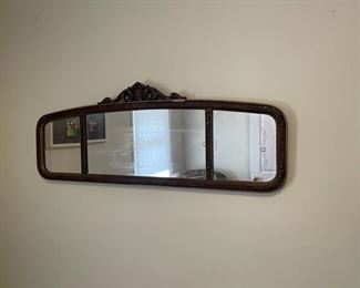 Antique wall mirror.