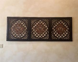 Ornate carved wall art