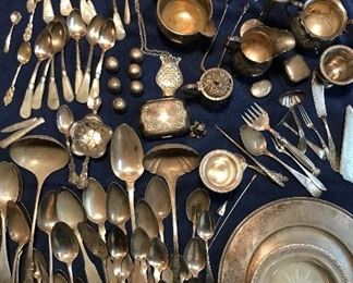 tons of sterling flatware and holloware
