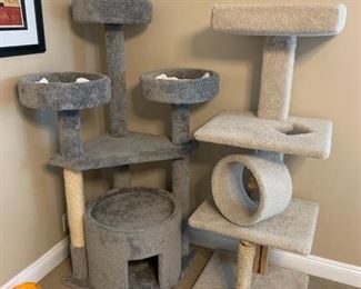 The grey cat stand sold. The other one is still available for sale. 