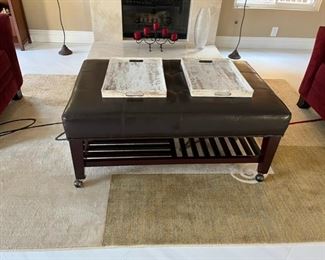 The coffee table sold. The items around it are still available. 
