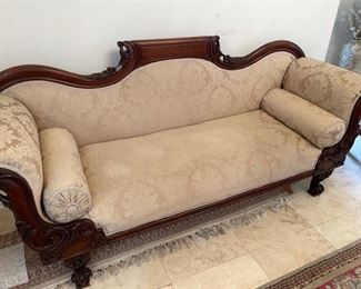 PRICE - $850; Beautiful Victorian scrolled-arm camelback sofa, custom made by Kimball; mahogany carved wood; gold moire fabric; excellent condition.