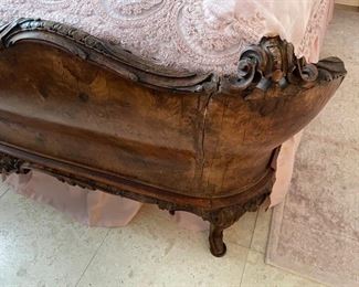 PRICE - $1,800; Early 1900s antique French queen bed; burl mahogany; headboard outfitted with side tables, mirrors and electrical outlets for lighting; headboard is 117" wide; footboard is 70" wide (88" from headboard to footboard).