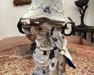 PRICE - $125; Delph blue/white porcelain lamp with figures.