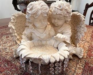 PRICE - $35; Pair angels overlooking a sunflower; table decor; 13" wide x 10" high.