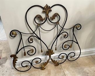 PRICE - $45; Metal wall decor with tassles.