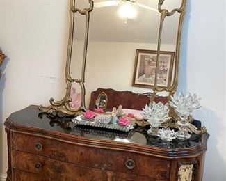 PRICE - $1,000/dresser and mirror; Early 1900s antique French dresser with gilt mirror; burl mahogany; dresser is 64" wide x 21" deep x 35" high; mirror is 37" wide x 52" high. Dresser and mirror can be sold separately at $725 (dresser) and $475 (mirror).