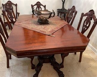 PRICE - $2,400/all; Gorgeous antique mahogany dining table with set/8 heavily carved Chippendale chairs (two arm/6 side) and 2 leaves; table measures 82" long (without leaves) x 48" wide.