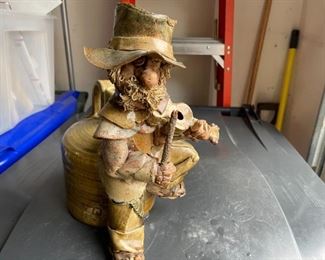 PRICE - $95; Pottery handmade fiddler figurine; signed.