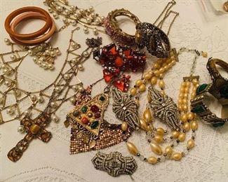 So much fine early costume jewelry. Pictured is a three piece Corocraft set, Bakelite bangles, several sterling brwcekets, 3 Coro Duet brooch’s plus more early rhinestones than you can imagine. Remember most is not photographed. 
 