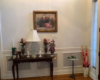 Sofa table, clown figurines, marble top table with cast iron base, clown figurines