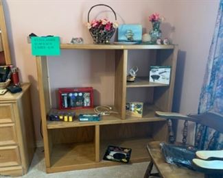 Entertainment center with golf games, poker chips, golf gifts