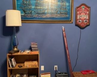 Shredder, box of office supplies, Ohio States wall light and painting