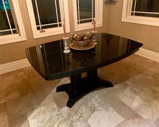 Beautiful granite top dining table with double pedestal wood base. 2 piece

