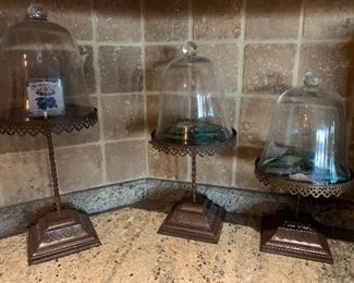 Set of 3 decorative display stands with  glass domes 