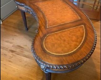 Beautiful leather embossed mahogany writing desk with brass ring  lion heads, gold foil etching. - 3 drawer

63.5”x25”x30.5”