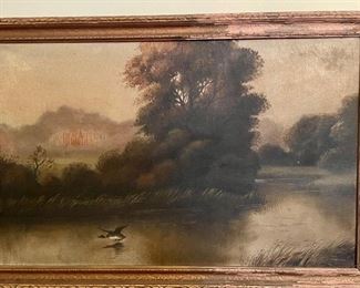 #3. MALLARD DUCK ON WATER WITH TREES.                  WITHOUT FRAME APPROX. 32 1/2 x 20 1/2.                      FRAME IS WORN.                                                                                     $350.00