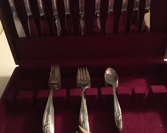 INTERNATIONAL STERLING FLATWARE. PRELUDE DESIGN. 46 PIECES. 4 PIECE PLACE SETTING PLUS 2 SERVING PIECES. SERVICE FOR 11.                                                                $3400.00.