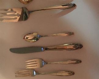 INTERNATIONAL STERLING FLATWARE. PRELUDE DESIGN. 46 PIECES. 4 PIECE PLACE SETTING PLUS 2 SERVING PIECES. SERVICE FOR 11.                                                                $3400.00